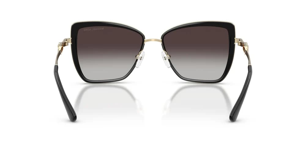 Lentes de sol Michael Kors Sea Island MK1178 negro y oro claro con mica gris degradada, vista posterior
